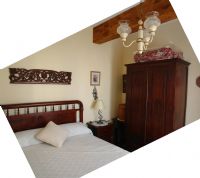 Habitación de matrimonio con baño en planta baja